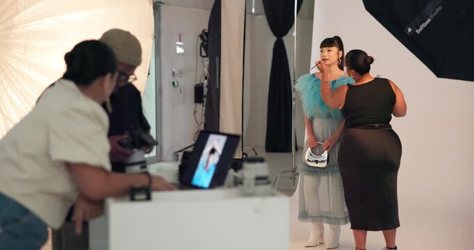 Backstage, stylist and makeup for model, beauty and photoshoot preparation, talk or makeover process. Behind the scenes, people and foundation application with tools, fashion and production setup