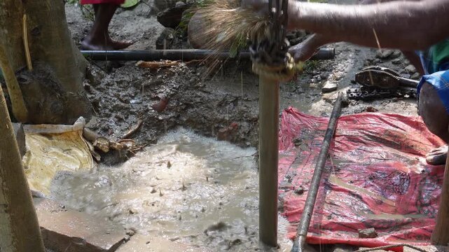 Borewell drilling in India accesses groundwater via rigs that penetrate soil and rock layers