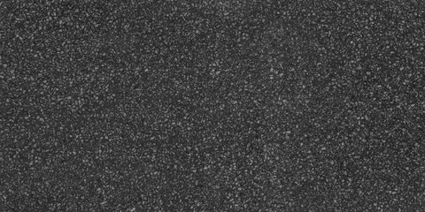 high density of samll, light grey aggregate chips embedded in a deep charcoal matrix, creating  a sophisticated look,dark charcoal texture background.