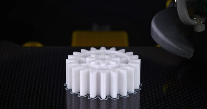 Smooth timelapse of 3D printing a nylon gear.