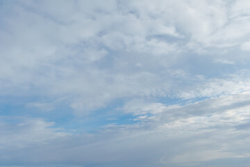 Obraz premium Dramatic cloudy sky with blue opening
