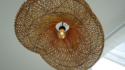 photo of a lamp with rattan decoration as an aesthetic interior design