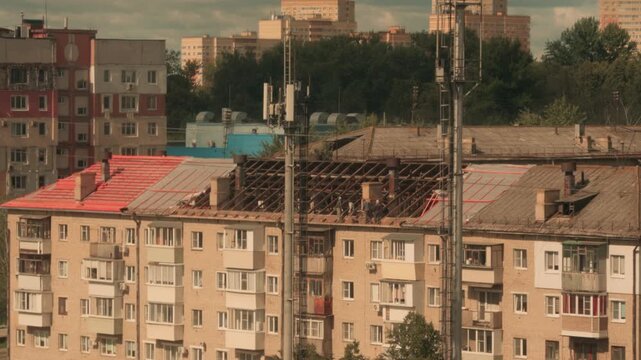 builders are installing a new roof