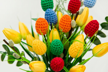 The breeze of spring. Easter composition with tulips and crocheted eggs. Featuring bouquets with handmade accents.

