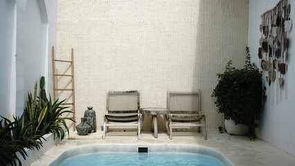 summer vacation photos at a villa with a private pool and lounge chairs