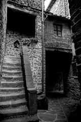 Borghi toscani in bianco e nero. Il borgo medievale di Volpaia circondato dai vigneti nella regione del Chianti Senese, Siena,Toscana. Italia