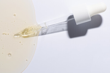 Liquid cosmetic product for the skin or medicine in a pipette. Copy space