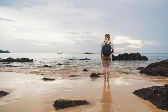 Rear view of woman on the beach Nai Thon Beach, Phuket, Thailand