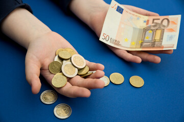 I count money for rent. The concept of saving money. Finance, business, investment. Saving savings at home. Spending cash on losses, real estate, debts, taxes. Inflation, poverty, economic crises.