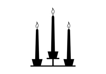 Fototapeta premium Silueta de candelabro con tres velas encendidas de color negro