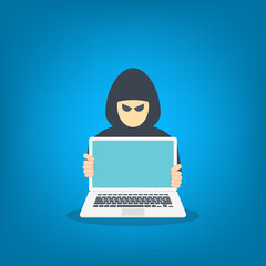 hacker in front of his computer committing digital cybercrime