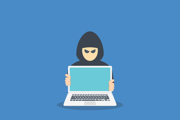 hacker in front of his computer committing digital cybercrime