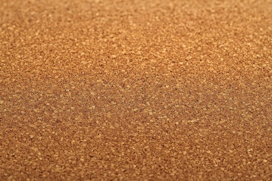 close-up warm corkboard texture with granular natural pattern evoking cozy earthy simplicity