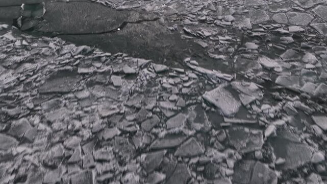 
Hummocks on the Kapchagai reservoir. Ice blocks covering the lake. Winter time. The view from the drone.