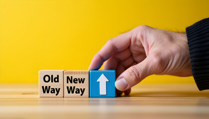 Old way to new way concept with hand placing arrow block, business change and direction strategy