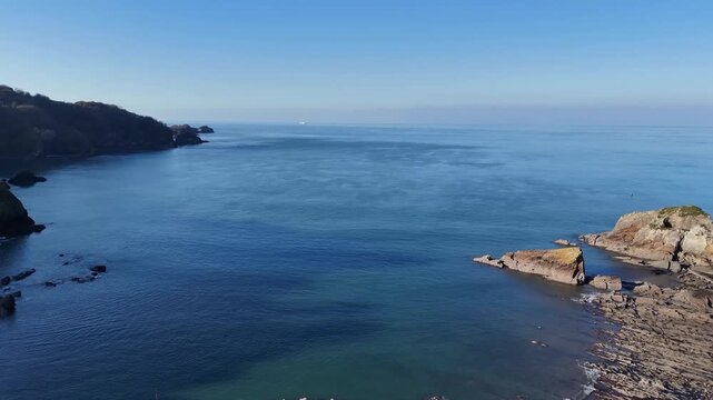 Aerial view over Combe Martin, Devon, from a drone 4K video