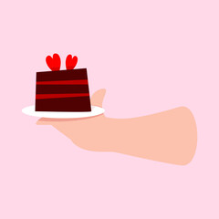 Woman Hand Holding a Slice of Chocolate Cake with Hearts for Mother's Day