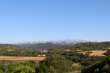Dirt path leading toward Estella on Camino de Santiago Frances in Navarra Spain July 2024