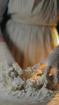 Female baker preparing dough for homemade pastry