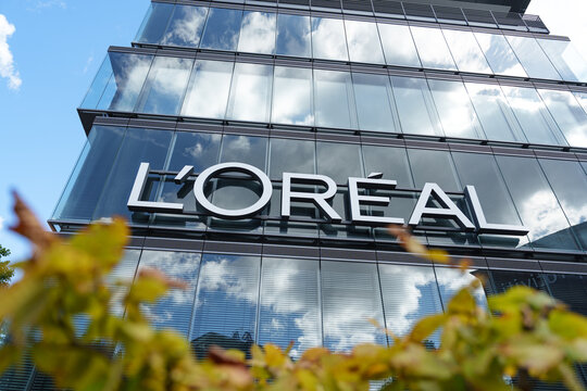 Logo of L'Oreal, world's largest cosmetics company on the exterior of an office building