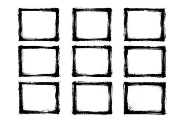 Abstract grunge squares pattern in black and white with rough edges.