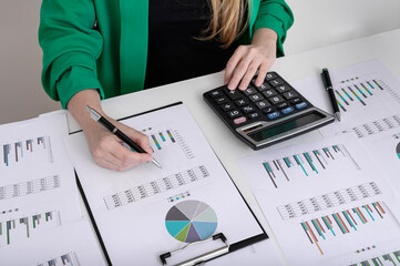 Woman accountant settling invoices, office work woman working, pit