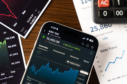 KRX or Korea Exchange logo is displayed on the screen of a smartphone, in Bangalore, India, on February 12, 2026