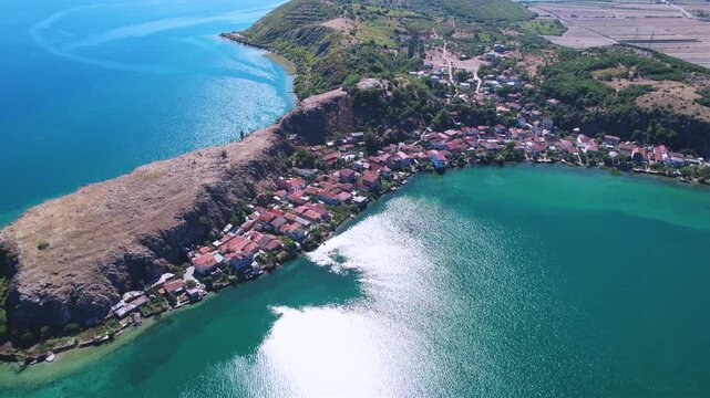Lin village, perched on a rocky peninsula of Lake Ohrid, blends serene waters with the beauty of its ancient mosaic. Pogradec, Albania 8 January 2026