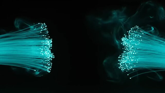 Futuristic adobepremiumvideo showcasing fiber optic technology with luminous blue cables and intricate network connections in a dark environment from a close-up viewpoint