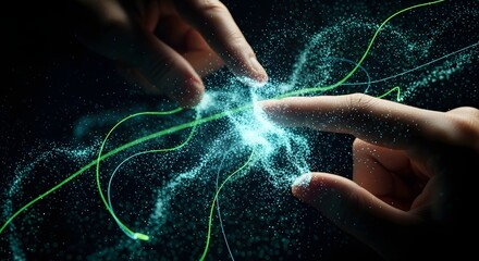 Human hands touching glowing blue-green abstract digital particles forming a futuristic data interface for technology and innovation