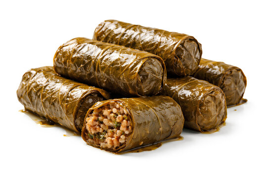 Traditional stuffed grape leaves with rice and herbs served with lemon and parsley, mediterranean dolma rolls isolated on white background, authentic homemade cuisine concept