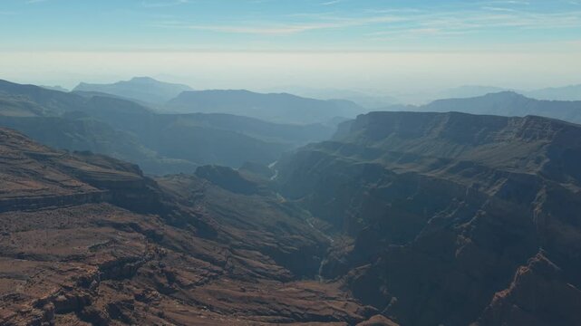 Aerial view of traditional terraced farms with falaj irrigation in Al Shuraijah, Oman
