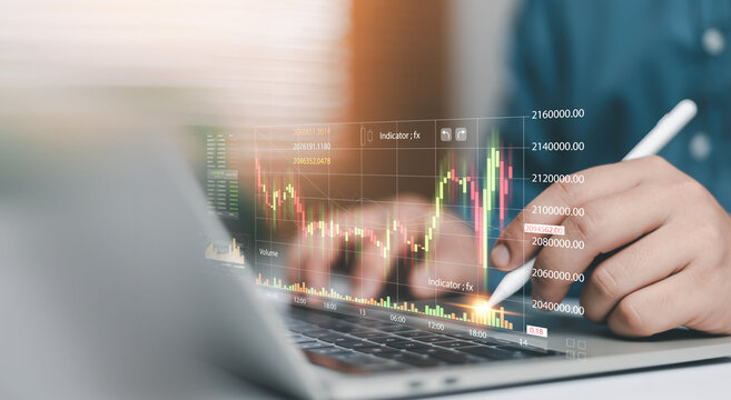 Business professional analyzing stock market data on laptop with stylus pen, financial chart overlay, forex trading strategy, investment analytics, fintech technology and economic growth concept.