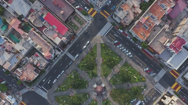 Overhead aerial view of la punta del callao main square and its streets with few cars driving