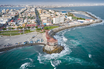 Drone footage panning back over the coastal district of la punta in callao, peru