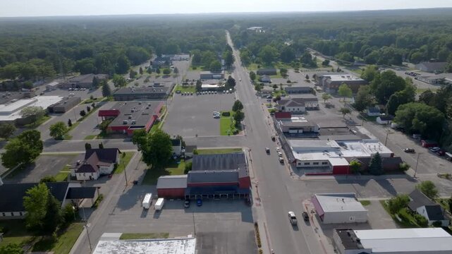Downtown White Cloud, Michigan with drone video moving sideways.