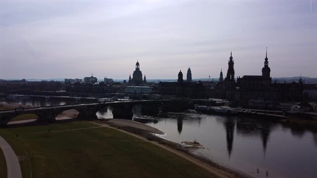 Cinematic traveling shot moving through or past Dresden&rsquo;s historic Altstadt. Featuring the iconic Frauenkirche dome, Zwinger Palace, and Semperoper, showcasing the city&rsquo;s stunning Baroque restoration