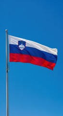 Slovenian Flag Waving in Clear Daylight