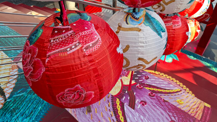 Traditional Decorative Chinese Paper Lanterns with Floral Patterns for Lunar New Year and Cultural Festival Celebration © Rungphailin