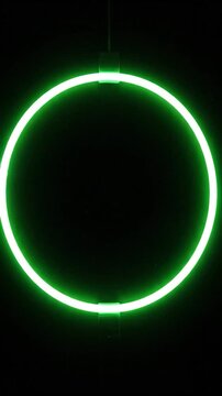 A vibrant blue neon light forms a perfect glowing circle on a dark background