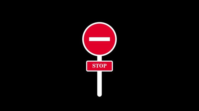 A red circular no entry sign is mounted on a white post with a small rectangular stop placard placed just below
