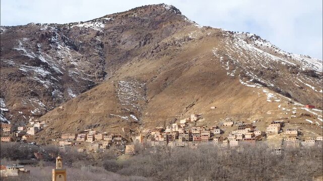 Large view of a Set of buildings on big mountain in Imlil town, Morocco.