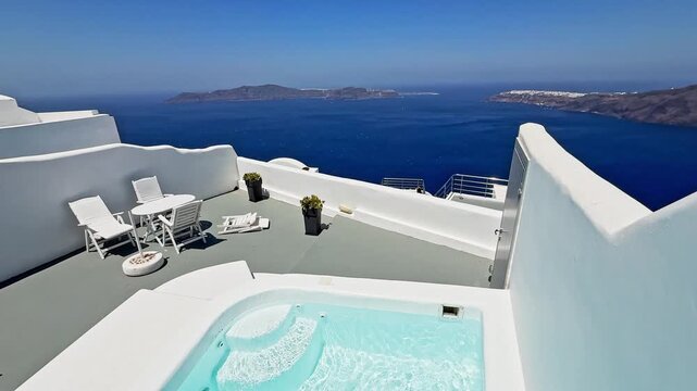 Luxury villa with infinity pool overlooking santorini caldera
