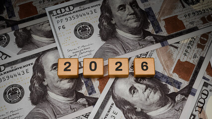 3D Rendered Wooden Blocks 2026 on US Dollar Banknotes Background, Financial Forecast Economic and Global Money Market 2026 Concept Illustration