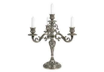 Fototapeta premium A silver candelabra with three white candles
