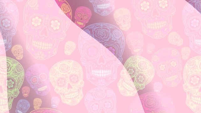 Colorful sugar skulls and flowers pattern on soft pink fabric texture viewed from above with intricate designs