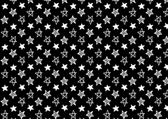 白黒の手描き星イラストパターン背景素材