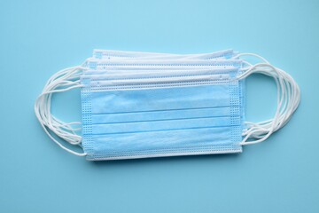 Blue protective masks on a blue background