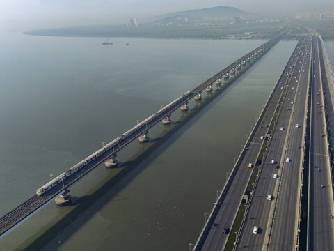 Aerial view of the Vashi Bridge stretching across the Thane Creek, a vital artery connecting Mumbai to Navi Mumbai, Maharashtra, India.