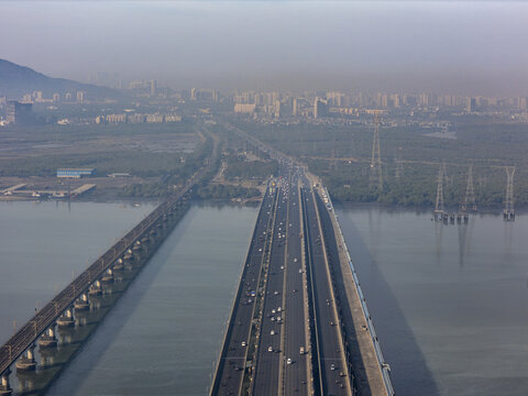 Aerial view of the Vashi Bridge stretching over the Thane Creek, a vital artery connecting Mumbai to Navi Mumbai, Maharashtra, India.